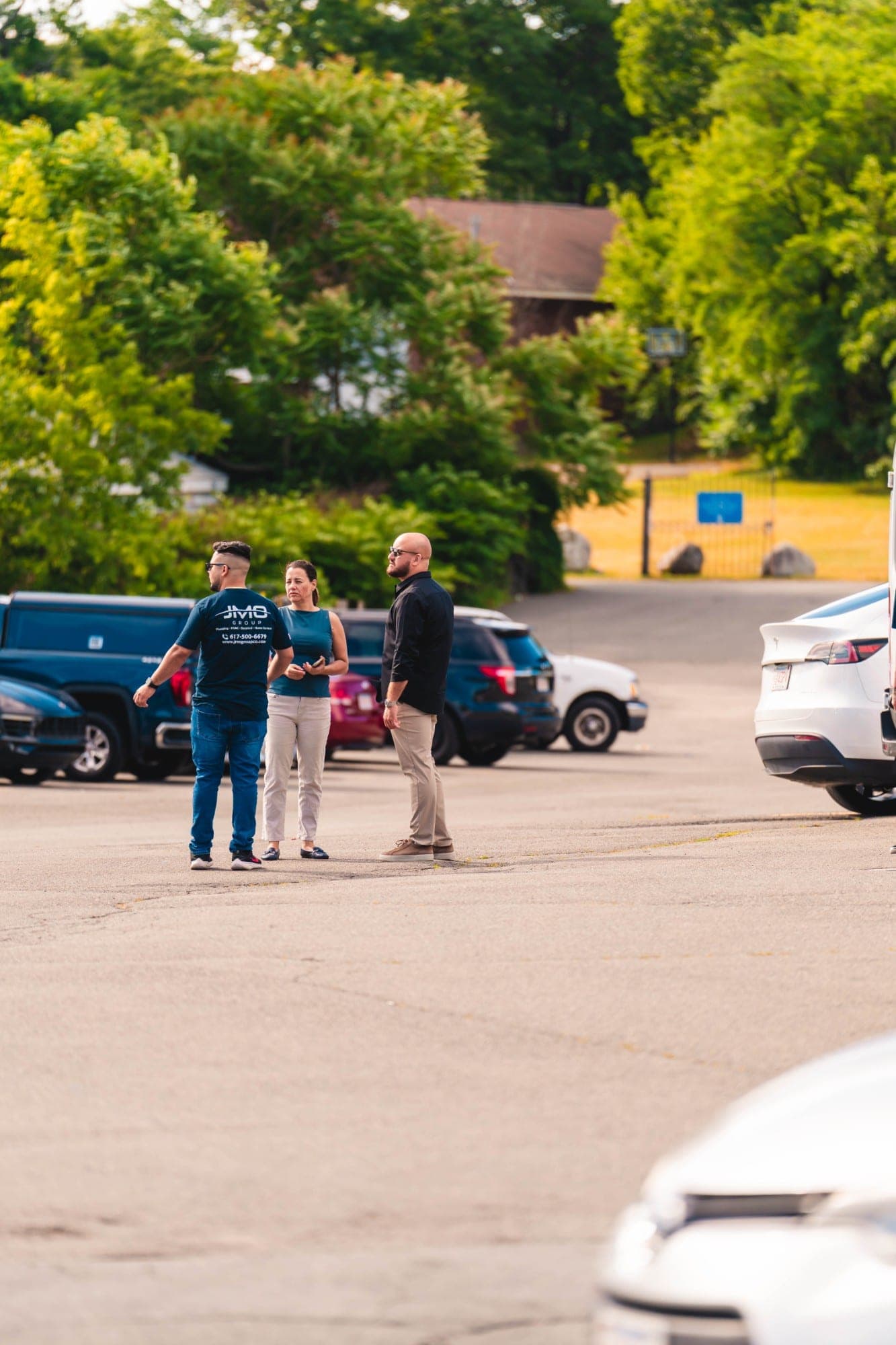 JMO team member meeting with a property team on site